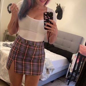Plaid mini skirt with split hem